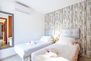 4 bedrooms, desk, iron/ironing board, travel cot