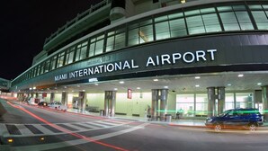 The exterior of Miami International Airport with a Wilcox Field Hotel sign. - Charming 1-bedroom apartment with AC, WiFi in vibrant Miami (Miami)
