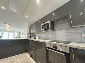 Fridge, microwave, oven, dishwasher - Chapel Terrace - 2 Bedroom House (Cleator Moor)