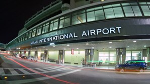 The exterior of Miami International Airport with a Wilcox Field Hotel sign. - Charming 1-bedroom apartment with AC, WiFi in Heart of Miami (Miami)