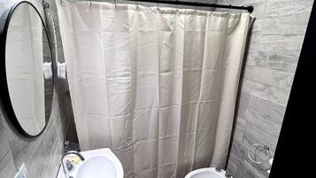 Hair dryer, towels, soap, toilet paper