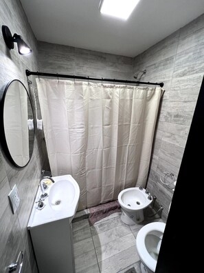 Hair dryer, towels, soap, toilet paper