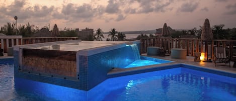 Outdoor pool, open 8:00 AM to 10:00 PM, pool umbrellas, pool loungers
