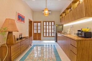 Fridge, microwave, stovetop, coffee/tea maker