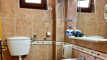 Standard Room, 1 Double Bed | Bathroom | Shower, hair dryer, towels, soap