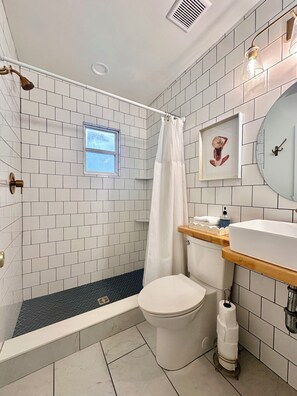 Shower, hair dryer, towels, soap