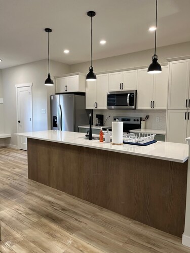 Welcome to Charming brand new 3-bedroom house in Regina. 