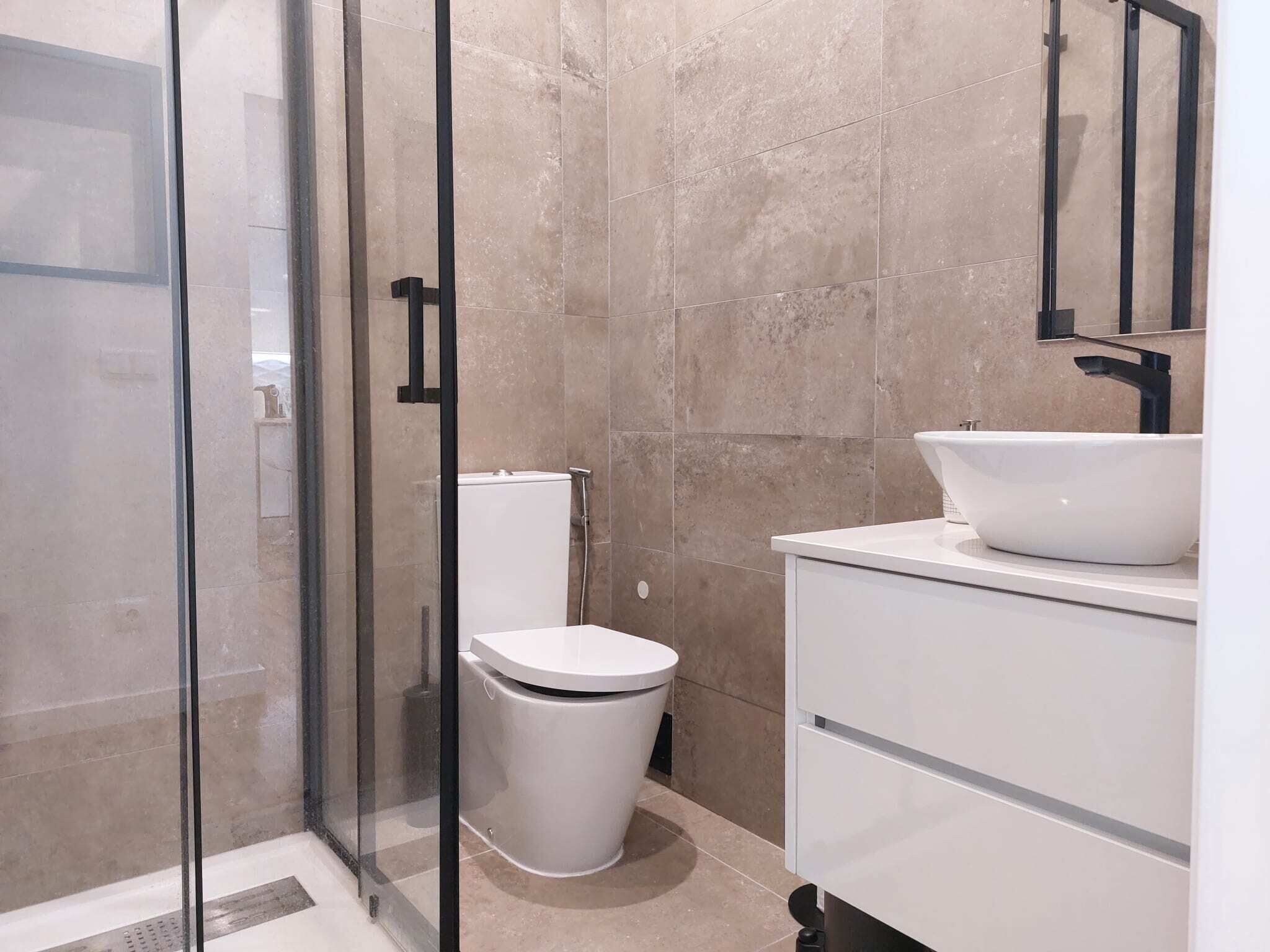 Shower, hair dryer, towels, toilet paper