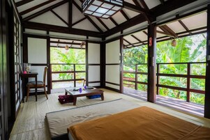 Habitación Deluxe, vistas al jardín | Zona de estar