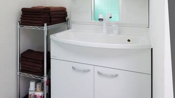 Hair dryer, bidet, towels, soap
