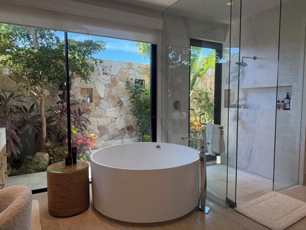 Shower, hair dryer, towels, soap