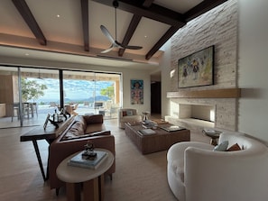 Smart TV, fireplace, books, printers