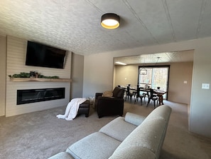 Smart TV, fireplace, table tennis, books