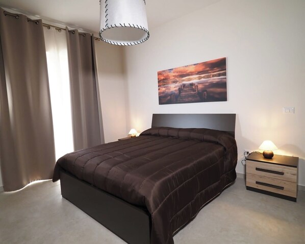 1 bedroom, desk, iron/ironing board, travel cot