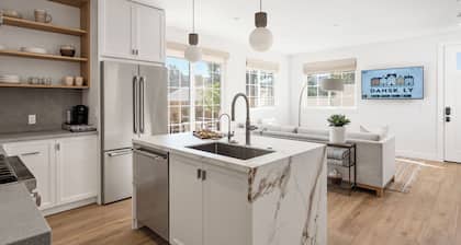 2 Bedroom Suite with Private Yard & Off-Street Parking. Full kitchen & living.