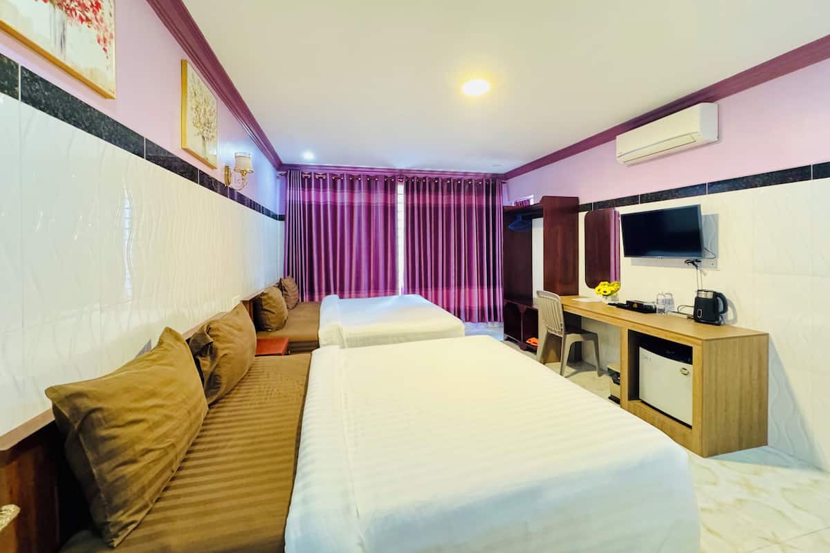 Chambre Deluxe avec lits jumeaux, 2 chambres, vue ville | Bureau, Wi-Fi gratuit