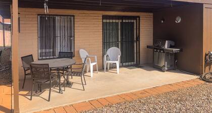 Single-level home with large yard, patio, grill, mountain views