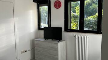 1 chambre, fer et planche Ă  repasser, Wi-Fi, draps fournis
