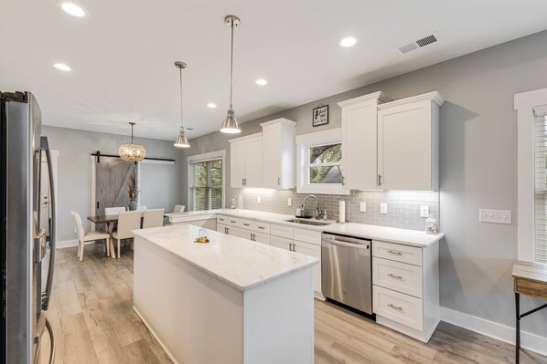 Fridge, microwave, dishwasher, coffee/tea maker