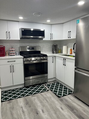 Fridge, microwave, oven, stovetop - Cozy basement suite in Elerslie . (Edmonton)