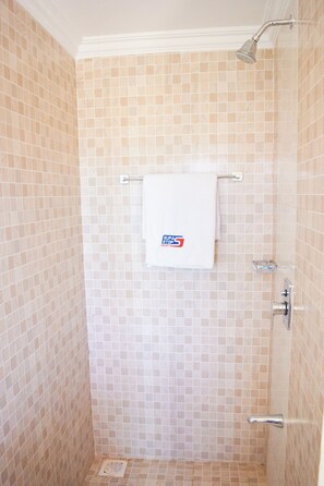 Basic Single Room | Bathroom | Shower, rainfall showerhead, towels, toilet paper - Supastop (Sultan Hamud)
