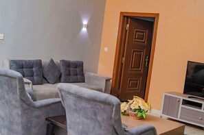 Deluxe Room, Balcony, City View | Living area - SoulCare Gardens Hotel (Sokoto)