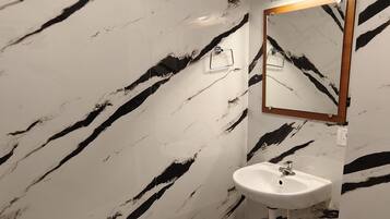 Luxury Quadruple Room, Balcony, Beach View | Bathroom | Shower, free toiletries, soap, shampoo