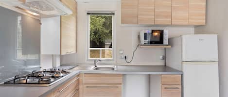 Fridge, microwave, cookware/dishes/utensils