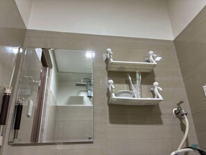 Shower, towels, soap, toilet paper