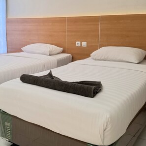 Superior Twin kamer | Een bureau, verduisterende gordijnen, geluiddichte muren, gratis wifi