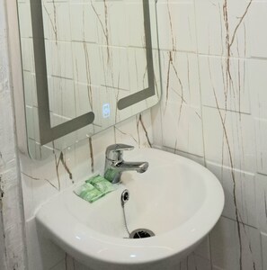 Superior Twin kamer | Badkamer | Gratis toiletartikelen, handdoeken, zeep, toiletpapier