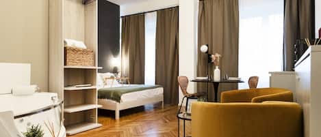 1 غرفة نوم ومكواة/لوح كي وواي فاي وملاءات أسرّة