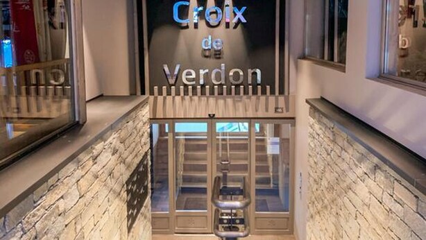 A modern interior with a sign reading "Croix de Verdon".