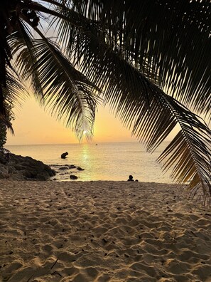 On the beach, sun loungers, beach towels