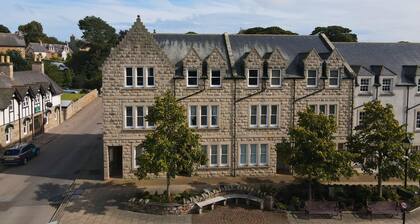 3-bedroom, fully furnished townhouse overlooking the historic Dornoch Square.