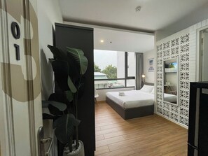 Deluxe Studio, Kitchenette, City View | Desk, laptop workspace, free WiFi