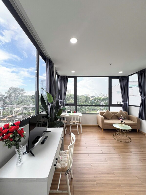 Luxury Penthouse, Kitchenette, City View | Living area | Flat-screen TV