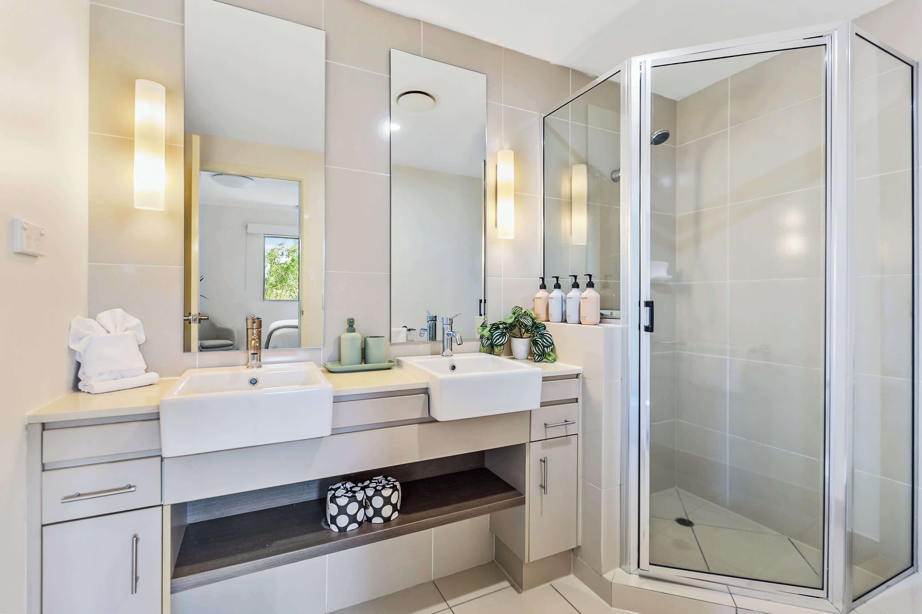 Shower, hair dryer, towels, shampoo