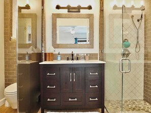 Shower, hair dryer, towels