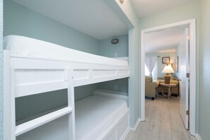 The cozy twin bunks in the alcove are ideal for an afternoon snooze - Jellyfish Cove | Oceanfront, Pools | Activity Inclusions (Panama City Beach)