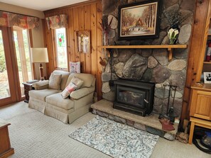 Smart TV, fireplace, DVD player, books