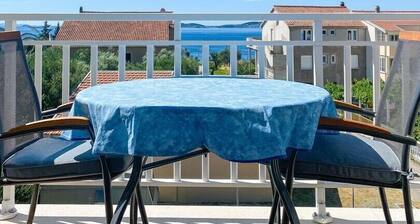 Comfortable 2-Bedroom Holiday Apartment with Balcony and Sea View