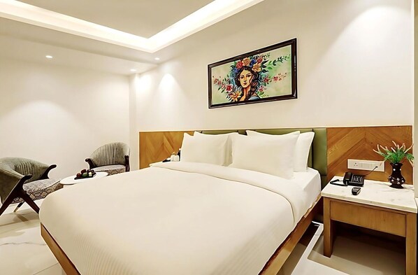 Luxury Double Room, City View | Living area | TV, fireplace