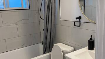 Hair dryer, towels, soap, toilet paper
