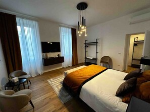 1 slaapkamer, een strijkplank/strijkijzer, wifi, beddengoed