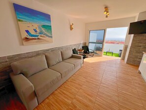 Comfort Bungalow, Sea View | Living area | 42-inch Smart TV with satellite channels - Sea View Bungalow with Communal Pool (Antigua)