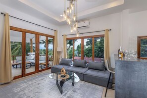 Design Villa, 2 Bedrooms, Terrace, Sea View | Living area | 72-inch Smart TV with digital channels, Netflix, iPod dock - BOHO Boutique Bungalows (Ko Pha-ngan)