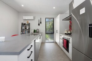 Fridge, dishwasher, toaster, cookware/dishes/utensils