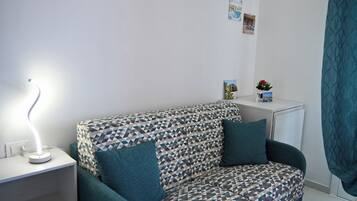 Camera Superior, vista città, fronte mare | Soggiorno