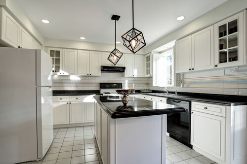 Sleek; 4 bedroom, two story with basement and Ping pong table in Thornhill